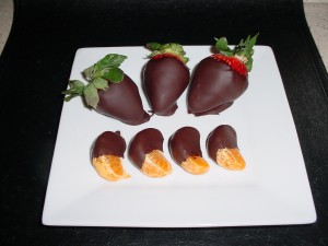 Chocolate dipped fresh strawberries and clementines
